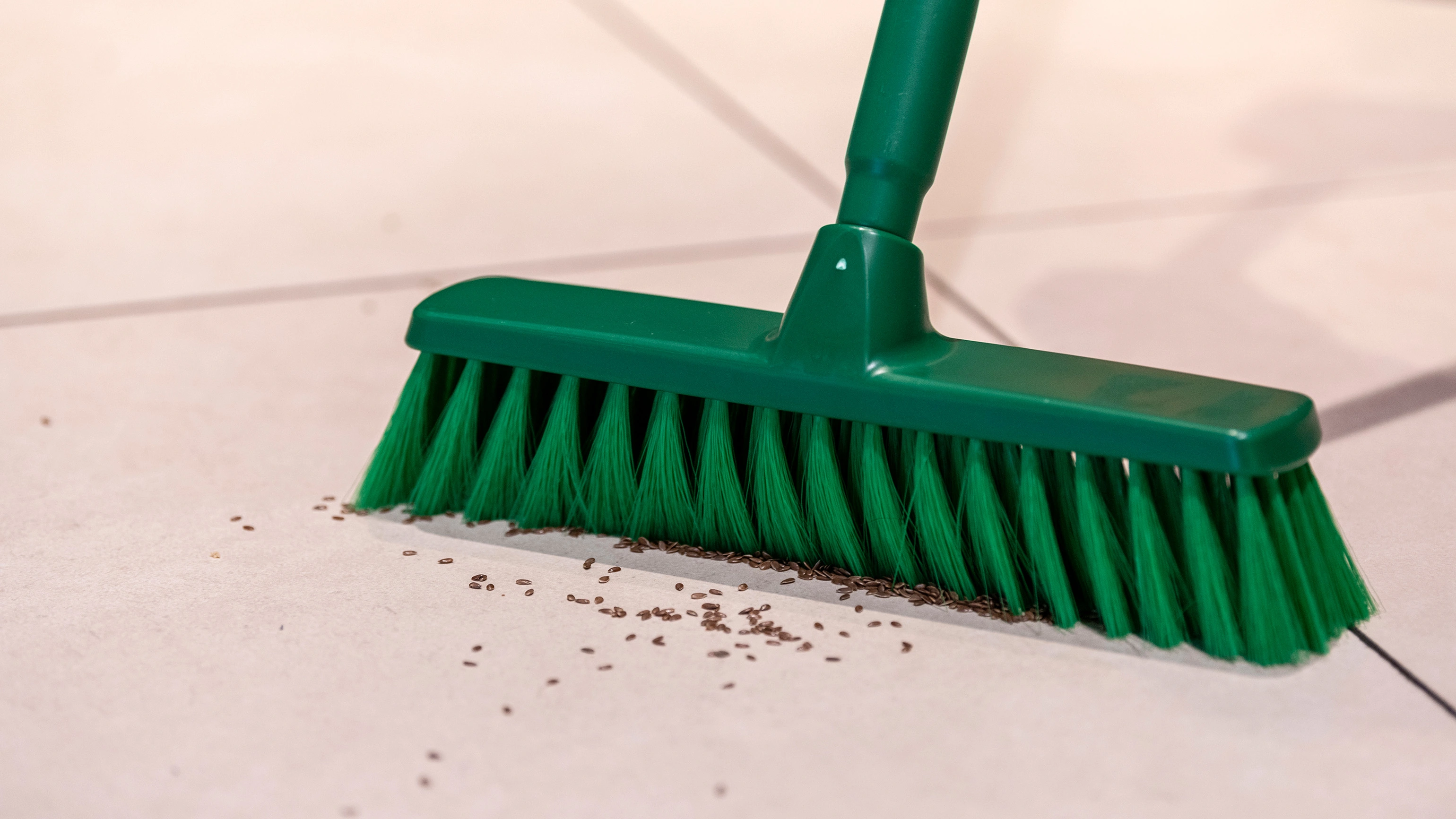 Green ColorCore broom in use