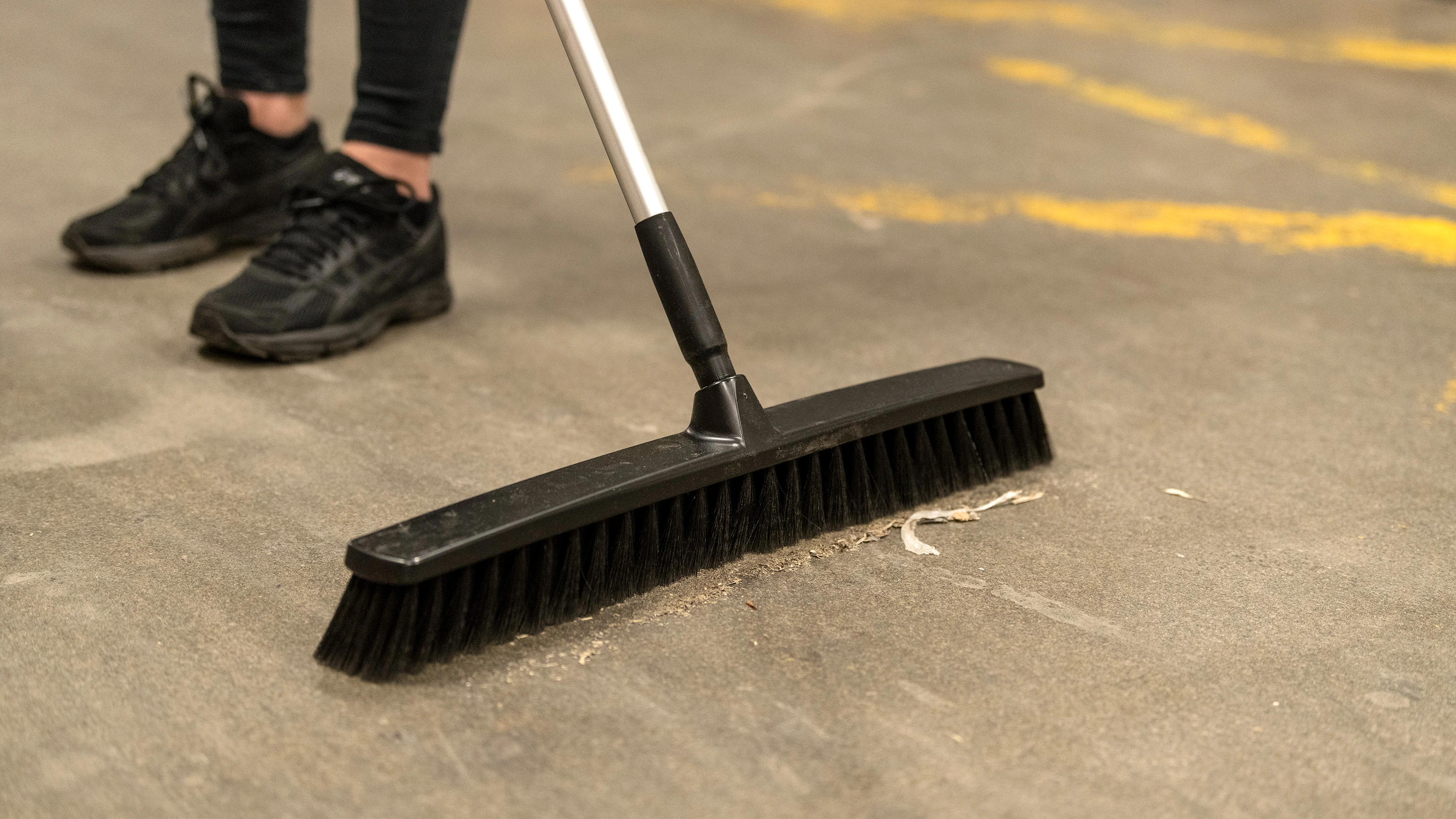 Black ColorCore broom in use